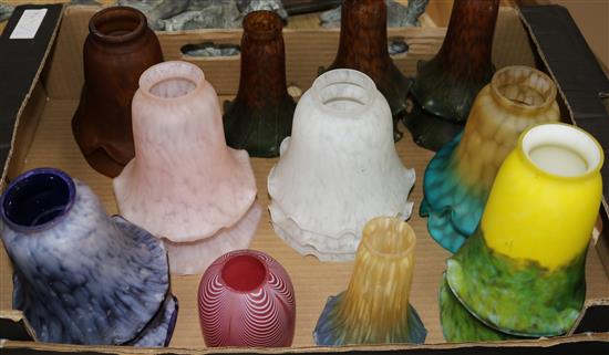 A collection of coloured glass shades